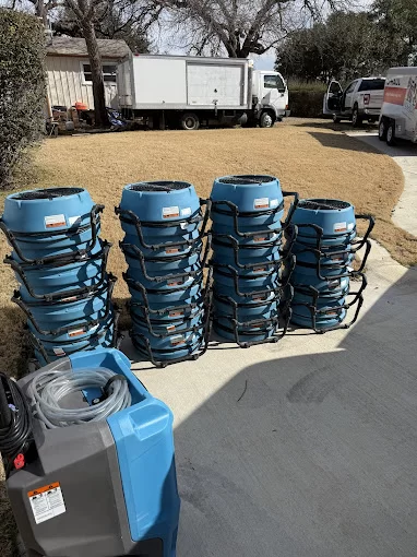 Extraction and drying equipment staged for a cleanup
